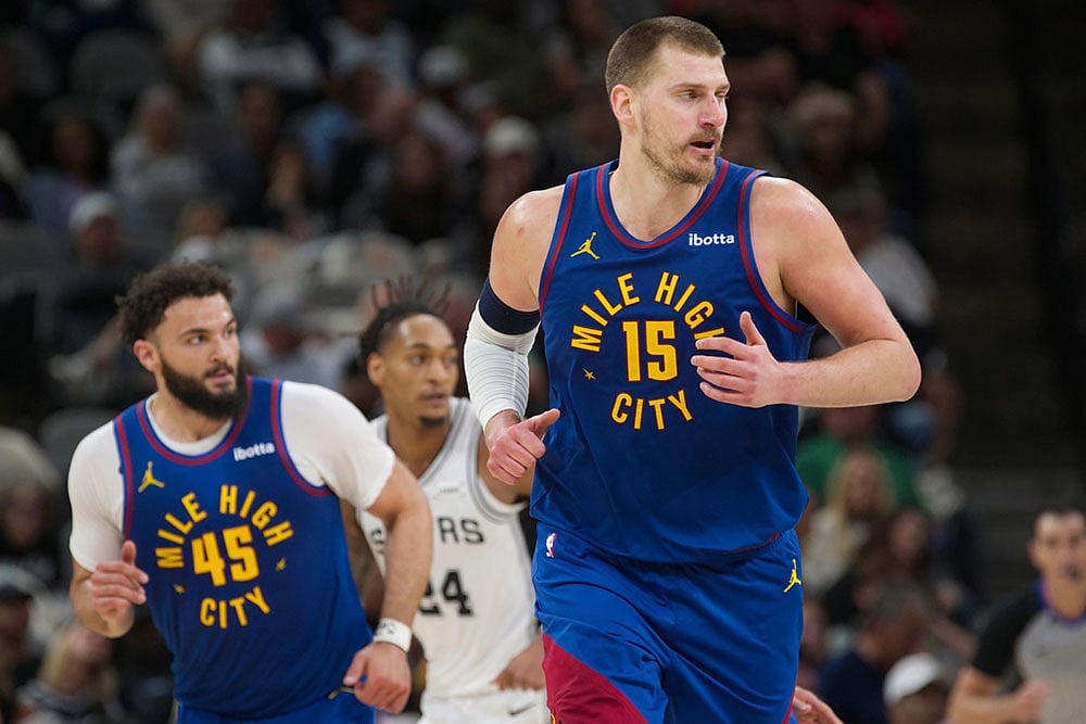| Photo: AP/Darren Abate : Denver Nuggets center Nikola Jokic (15) runs up court during the first half of an NBA basketball game against the San Antonio Spurs in San Antonio.