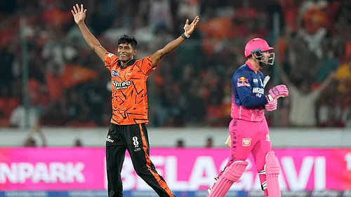 AP Photo : Sakib Hussain celebrates the wicket of Donovan Ferreira during SRH vs RR IPL 2026 match.
