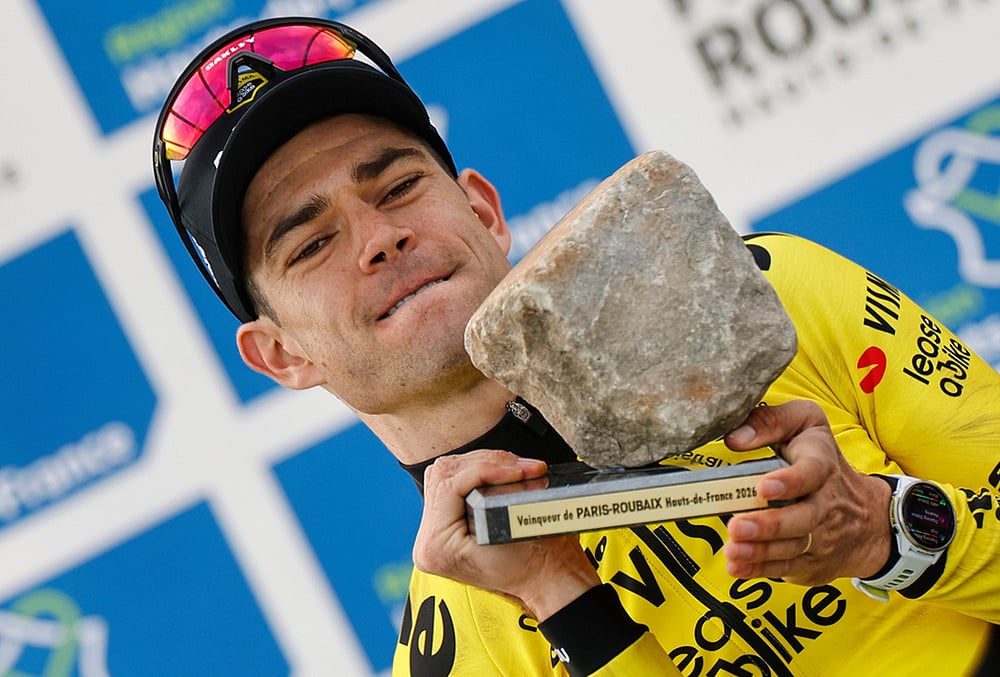 | Photo: AP/Jean-Francois Badias : Belgiums Wout van Aert celebrates on the podium after winning the Paris-Roubaix cycling race in Roubaix, France.