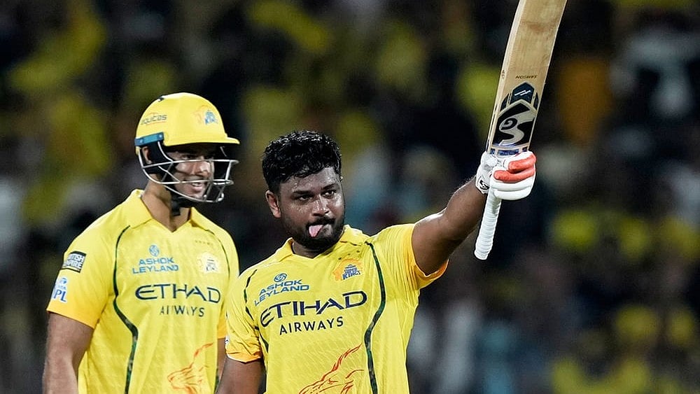 | Photo: AP/Mahesh Kumar A. : Chennai Super Kings Sanju Samson, right, celebrates his century during the Indian Premier League cricket match between Chennai Super Kings and Delhi Capitals in Chennai.