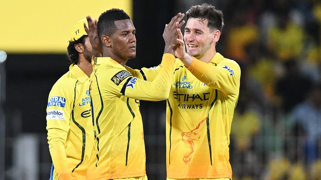 AP : Chennai Super Kings Akeal Hosein, centre, celebrates with teammates the wicket of Kolkata Knight Riders Angkrish Raghuvanshi during their Indian Premier League match in Chennai.