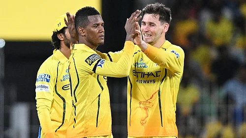 AP : Chennai Super Kings Akeal Hosein, centre, celebrates with teammates the wicket of Kolkata Knight Riders Angkrish Raghuvanshi during their Indian Premier League match in Chennai.