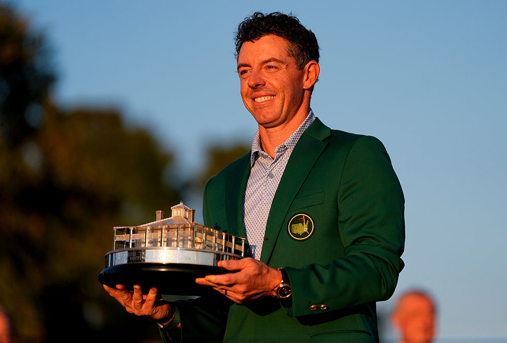 | Photo: AP/Ashley Landis : Rory McIlroy, of Northern Ireland, holds the trophy after winning the Masters golf tournament at the Augusta National Golf Club in Augusta, Georgia.