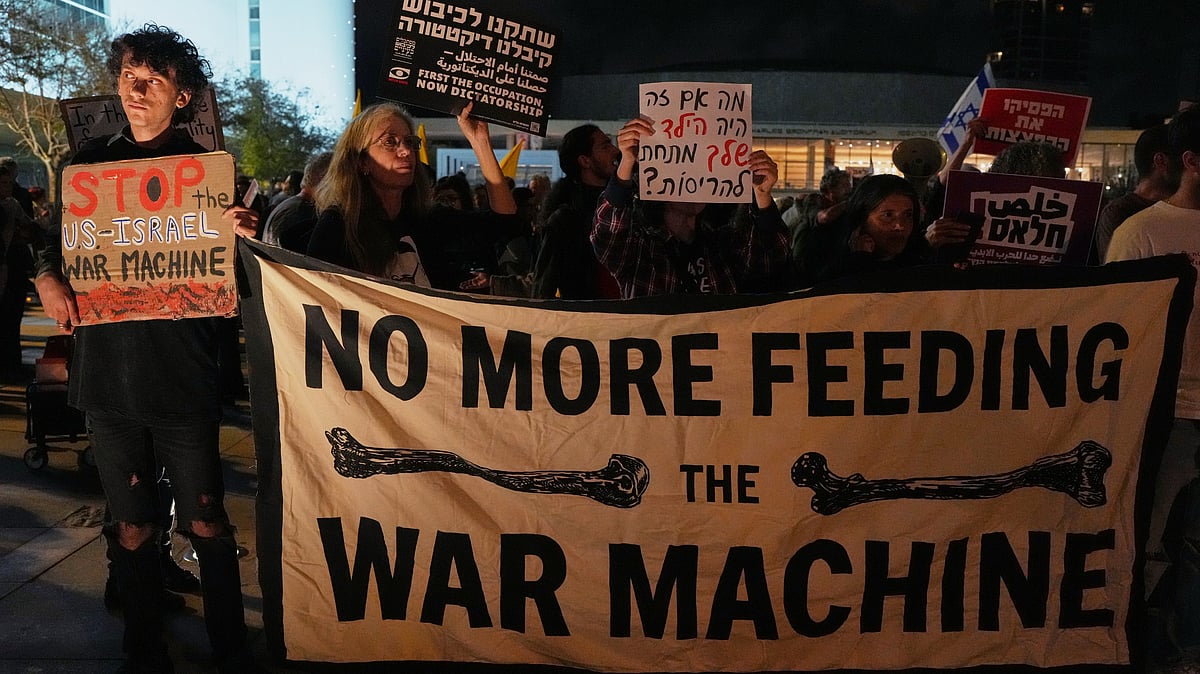 Photo: AP/Maya Levin : People take part in a protest calling for the end of the war, in Tel Aviv, Israel, Saturday, April 11, 2026.