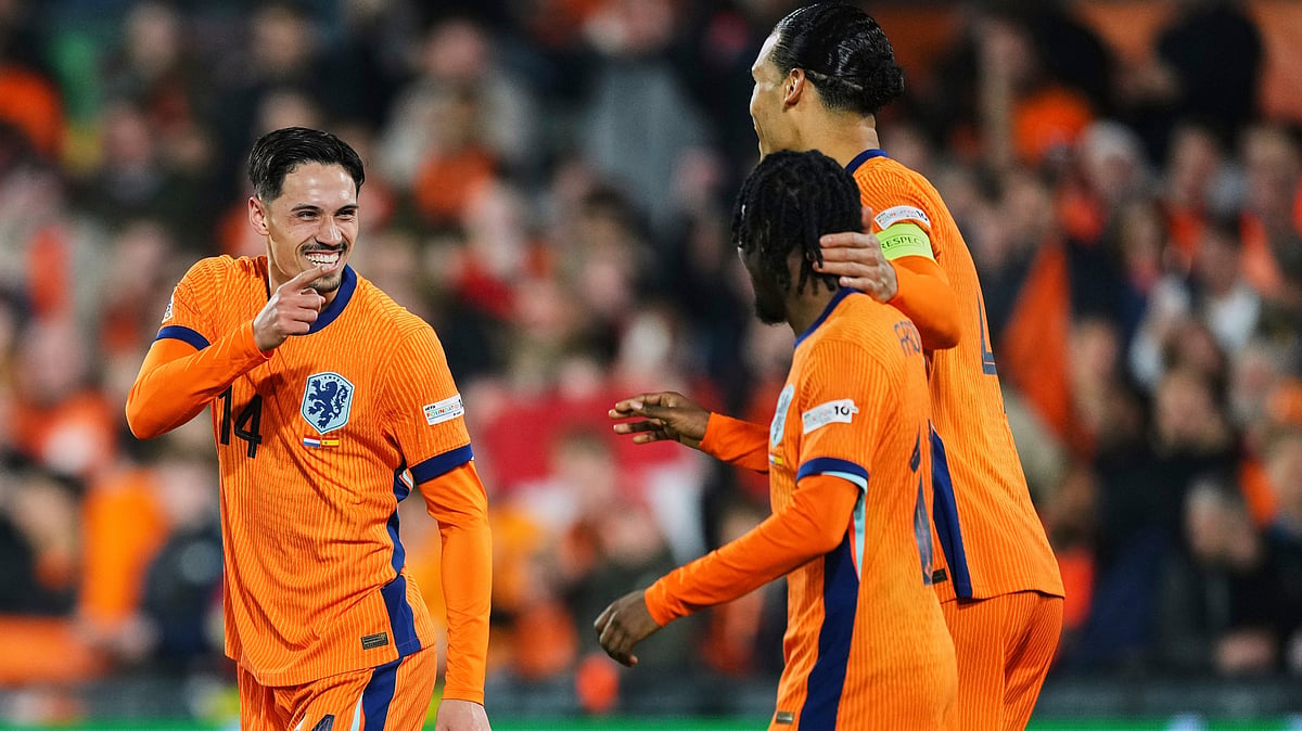 | Photo: AP/Peter Dejong : Netherlands' Tijjani Reijnders, left, celebrates after scoring his side second goal during the UEFA Nations League quarterfinal first leg match between the Netherlands and Spain at De Kuip stadium in Rotterdam, Netherlands, Thursday, March 20, 2025.