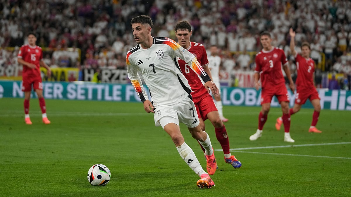 | Photo: AP/Darko Vojinovic : Germany's Kai Havertz, front, controls the ball challenged by Denmark's Andreas Christensen during a round of sixteen match at the Euro 2024 soccer tournament in Dortmund, Germany, Saturday, June 29, 2024.