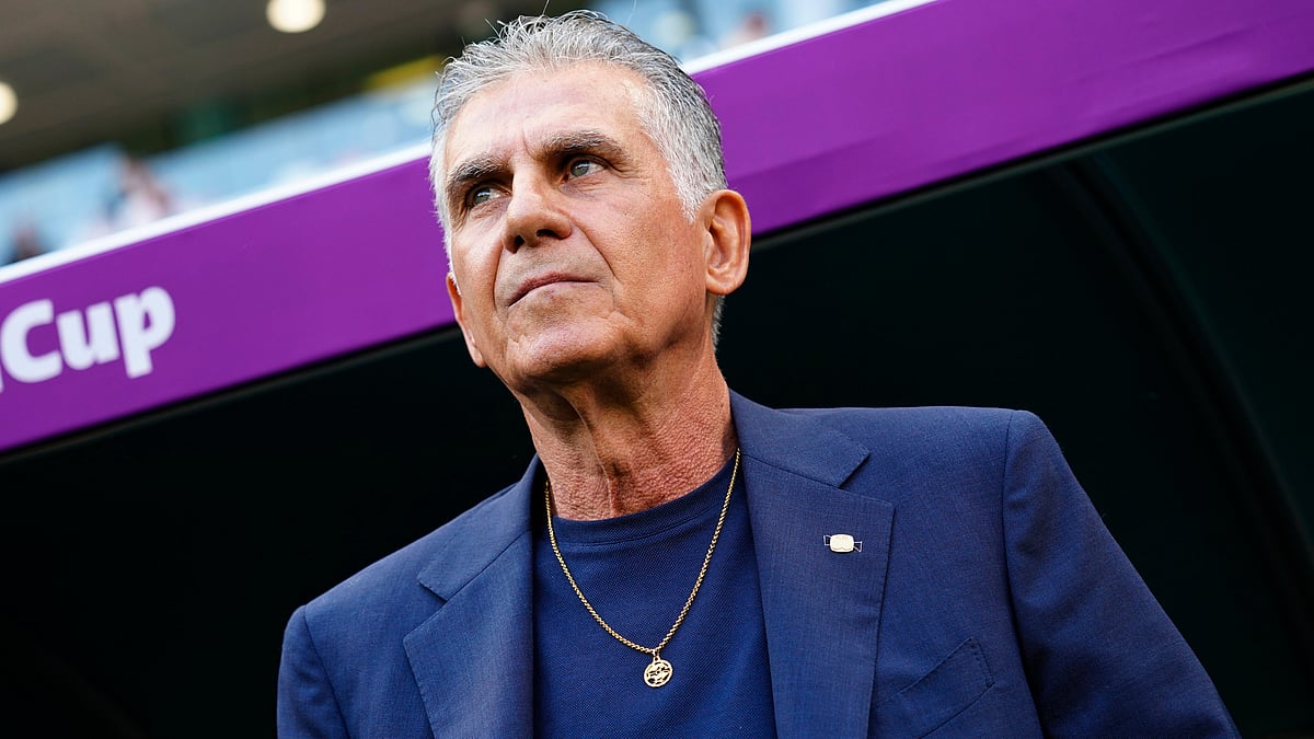 | Photo: AP/Pavel Golovkin : Iran's head coach Carlos Queiroz looks on ahead the start of the World Cup group B soccer match between Wales and Iran at the Ahmad Bin Ali Stadium, in Al Rayyan, Qatar, Nov. 25, 2022.