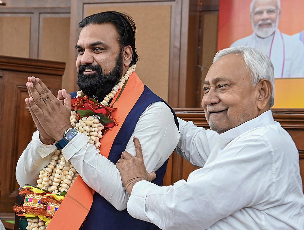 | Photo: PTI : JD(U) national president Nitish Kumar greets Bihar Deputy Chief Minister Samrat Choudhary during the National Democratic Alliance (NDA) legislators meeting, in Patna.