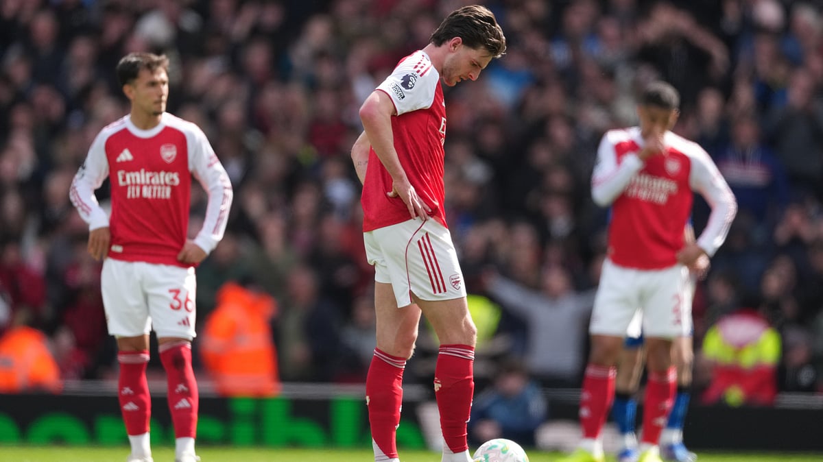 | Photo: AP/Dave Shopland : Arsenal's Declan Rice stands dejeted after conceding a goal during the Premier League soccer match between Arsenal and Bournemouth in London, England Saturday, April 11, 2026.