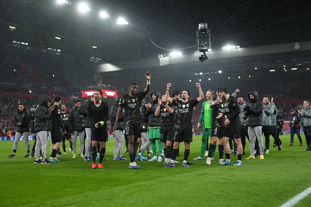 | Photo: AP/Jon Super : PSG players celebrate after the Champions League quarterfinal second leg soccer match between Liverpool and Paris Saint-Germain in Liverpool, England.