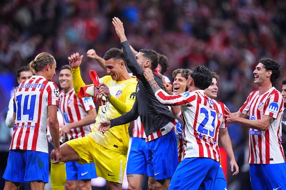 | Photo: AP/Manu Fernandez : Atletico Madrids players celebrate at the end of the Champions League quarterfinal second leg soccer match between Atletico Madrid and Barcelona in Madrid, Spain.