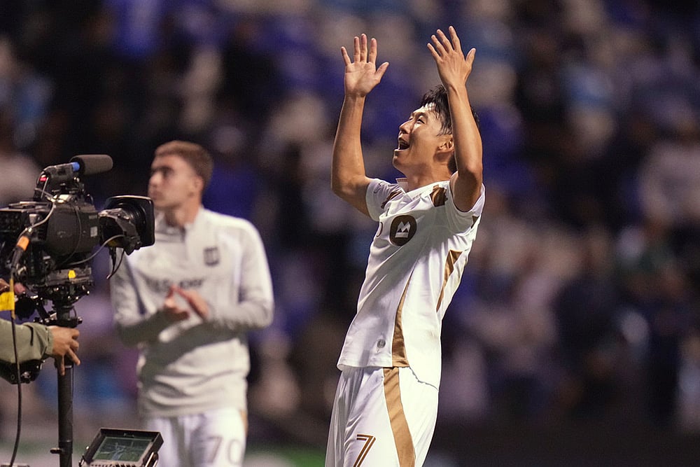 | Photo: AP/Eduardo Verdugo : Son Heung-Min of the United States Los Angeles FC celebrates at the end of a CONCACAF Champions Cup quarterfinal second leg soccer match against Mexicos Cruz Azul in Puebla, Mexico.