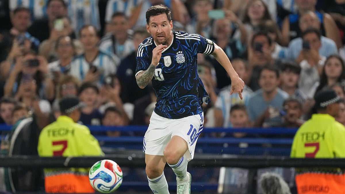 | Photo: AP/Gustavo Garello : Argentinas Lionel Messi dribbles during a friendly soccer match against Zambia in Buenos Aires, Argentina, Tuesday, March 31, 2026. 