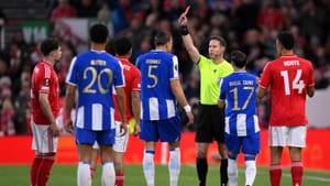 Gary Oakley/PA via AP : Jan Bednarek, center, is shown a red card and sent off by referee Danny Makkelie during the Europa League quarterfinal second leg soccer match.