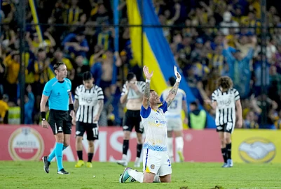 | Photo: AP/Jorge Saenz : Enzo Copetti of Argentinas Rosario Central celebrates at the end of Copa Libertadores Group H soccer match against Paraguays Libertad in Asuncion, Paraguay.