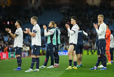 | Photo: AP/Dave Shopland : Bolognas team after the Europa League quarterfinal second leg soccer match between Aston Villa and Bologna, in Birmingham, England.