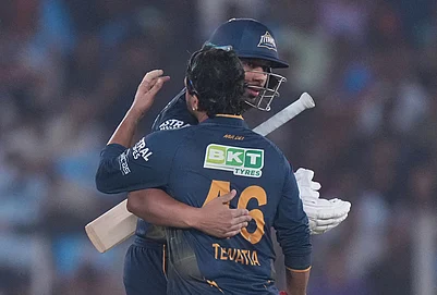 | Photo: AP/Ajit Solanki : Gujarat Titans Shahrukh Khan and Rahul Tewatia celebrate the win over Kolkata Knight Riders during the Indian Premier League cricket match in Ahmedabad.