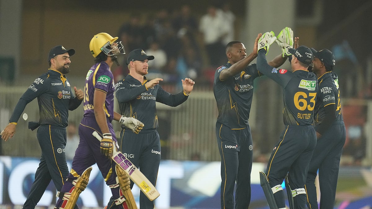 (AP Photo/Ajit Solanki) : Gujarat Titans Kagiso Rabada, third from right, celebrates with teammates the wicket of Kolkata Knight Riders Angkrish Raghuvanshi, left, walks during the Indian Premier League cricket match between Gujarat Titans and Kolkata Knight Riders in Ahmedabad, India, Friday, April 17, 2026.