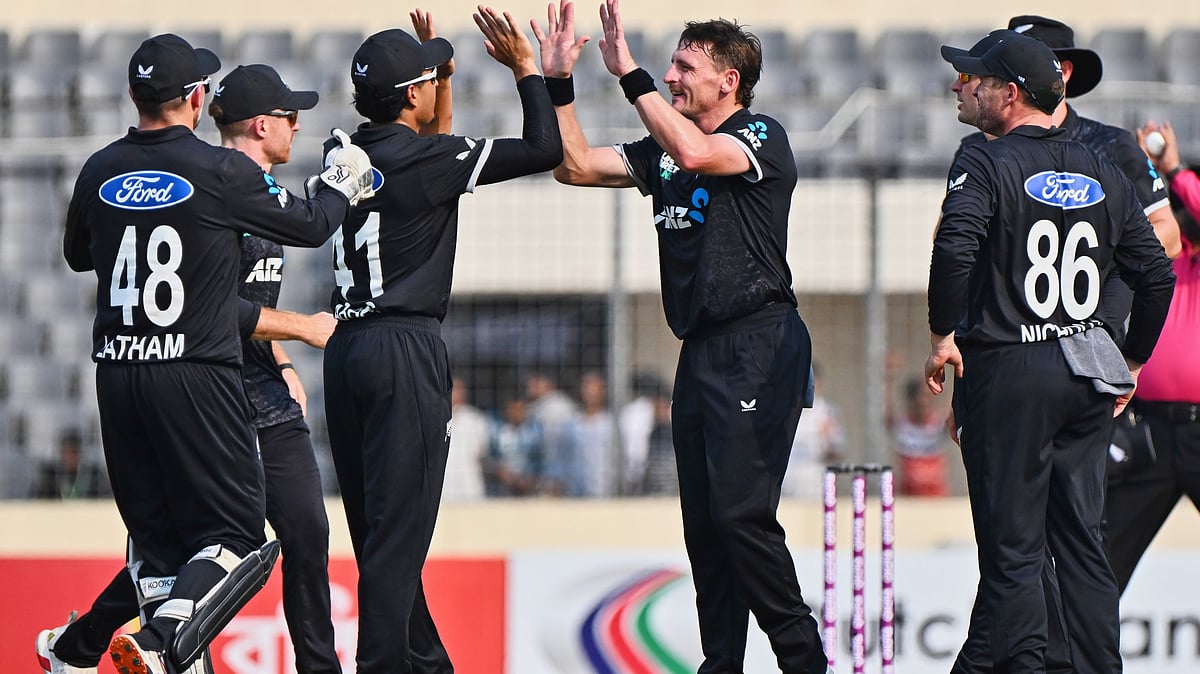 AP Photo : New Zealands Nathan Smith, celebrates with teammates the wicket of Bangladeshs Tanzid Hasan during the first one day international cricket match between Bangladesh and New Zealand.