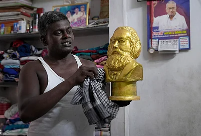 | Photo: Suresh Pandey/OUTLOOK : Meet Karl Marx. In this part of the world, he is not the philosopher or economist who altered the course of world history, but a Communist — a construction worker by profession. He lives with his family in a modest one-room house. In a State that prides itself on its Dravidian legacy, Marx, like many others in this village, nurtures a quiet hope: to build a just, classless society — the very ideal that Marxists have long envisioned. “My father was a Communist. He gave me this name, and I carry it with pride.” he says