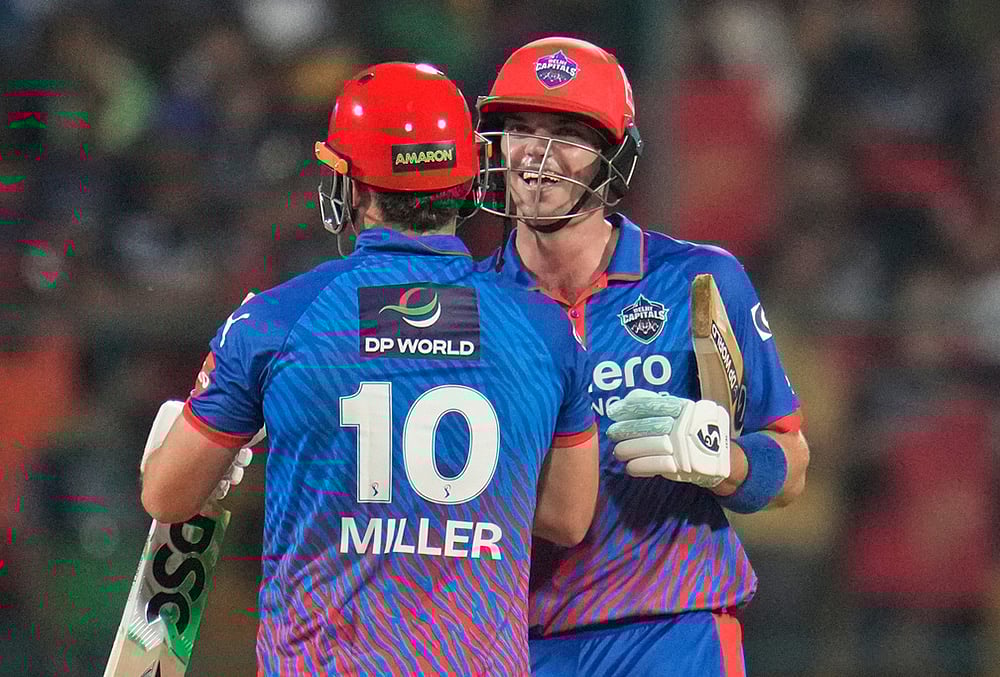 | Photo: AP/Aijaz Rahi : Delhi Capitals Tristan Stubbs and David Miller celebrate their win in the Indian Premier League cricket match between Royal Challengers Bengaluru and Delhi Capitals in Bengaluru.
