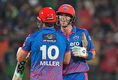 | Photo: AP/Aijaz Rahi : Delhi Capitals Tristan Stubbs and David Miller celebrate their win in the Indian Premier League cricket match between Royal Challengers Bengaluru and Delhi Capitals in Bengaluru.