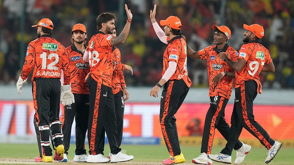 Photo: AP/Mahesh Kumar A. : Sunrisers Hyderabads Nitish Kumar Reddy, third left, celebrate with teammates the wicket of Chennai Super Kings Sanju Samson during their Indian Premier League match.