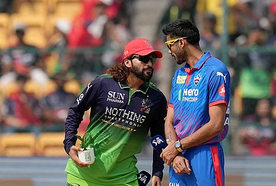 | Photo: PTI/Shailendra Bhojak : Royal Challengers Bengalurus captain Rajat Patidar, left, and Delhi Capitals captain Axar Patel during the toss before an Indian Premier League (IPL) 2026 T20 cricket match between Royal Challengers Bengaluru and Delhi Capitals, in Bengaluru, Karnataka.