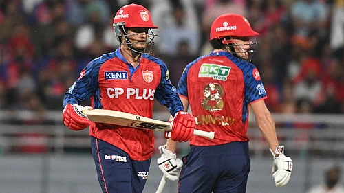 AP : Cooper Connolly, right, and his batting partner Priyansh Arya run between the wickets during the Indian Premier League match between Punjab Kings and Lucknow Super Giants in New Chandigarh.