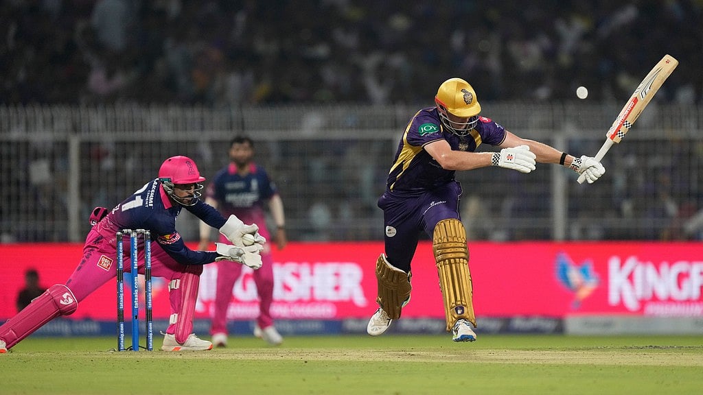 AP/Bikas Das : Rajasthan Royals Dhruv Jurel, left, collects the ball before stumping Kolkata Knight Riders Cameron Green, right, out during their Indian Premier League match in Kolkata.