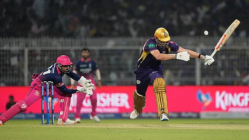 AP/Bikas Das : Rajasthan Royals Dhruv Jurel, left, collects the ball before stumping Kolkata Knight Riders Cameron Green, right, out during their Indian Premier League match in Kolkata.