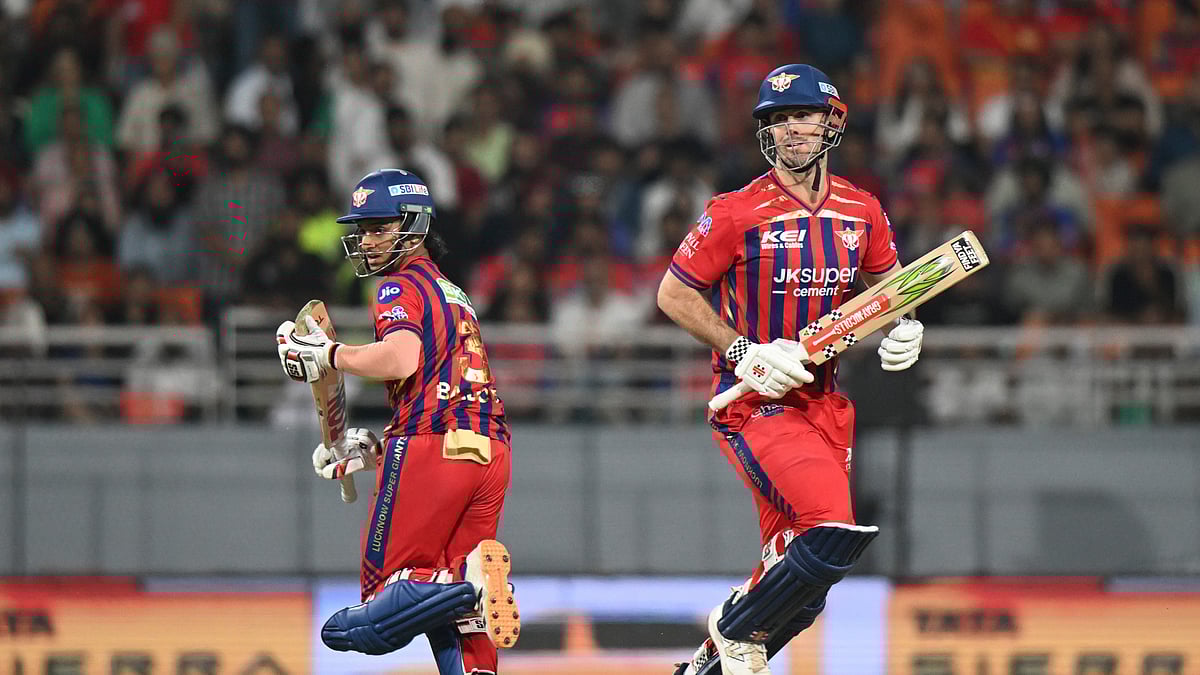 (AP Photo) : Lucknow Super Giants Mitchell Marsh, right, and his batting partner Ayush Badoni run between the wickets during the Indian Premier League cricket match between Punjab Kings and Lucknow Super Giants in New Chandigarh, India, Sunday, April 19, 2026.