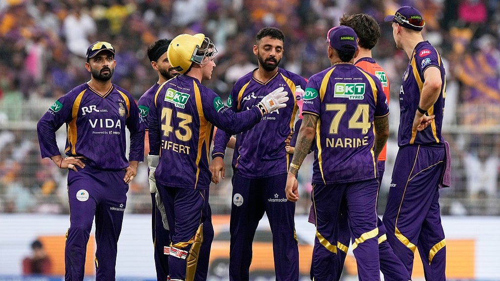 AP/Bikas Das : Kolkata Knight Riders Varun Chakravarthy, centre, celebrates with teammates the wicket of Rajasthan Royals captain Riyan Parag during their Indian Premier League match at the Eden Gardens.