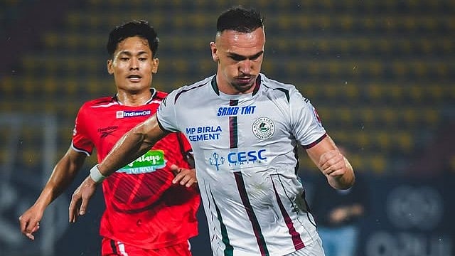 | Photo: Instagram/indiansuperleague : Mohun Bagan's Tom Aldred in action against NorthEast United FC's Lalrinzuala Hauhnar during their Indian Super League match on April 19, 2026.