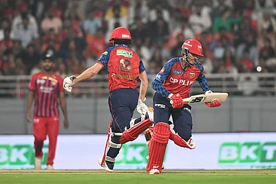 | Photo: AP : Punjab Kings Priyansh Arya, right, and his batting partner Cooper Connolly run between the wickets during the Indian Premier League cricket match between Punjab Kings and Lucknow Super Giants in New Chandigarh, India.