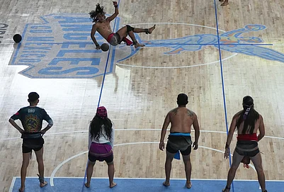 | Photo: AP/Fernando Llano : A player returns a ball during an ulama championship, a traditional ballgame with roots in Mesoamerican culture, in Mexico City.