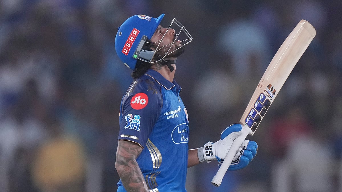 AP Photo : Tilak Varma celebrates after scoring half-century in GT vs MI IPL 2026 match at Narendra Modi Stadium in Ahmedabad. 