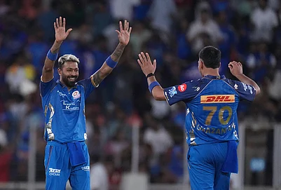 | Photo: AP/Ajit Solanki : Mumbai Indians captain Hardik Pandya, left, celebrates after winning the match the Indian Premier League cricket match against Gujarat Titans in Ahmedabad.