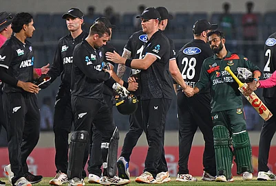 | Photo: AP/Mosaraf Hossain : Bangladeshs captain Mehidy Hassan Miraz shake hand with New Zealand players, after winning the second one day international match against New Zealand, in Mirpur, Bangladesh.