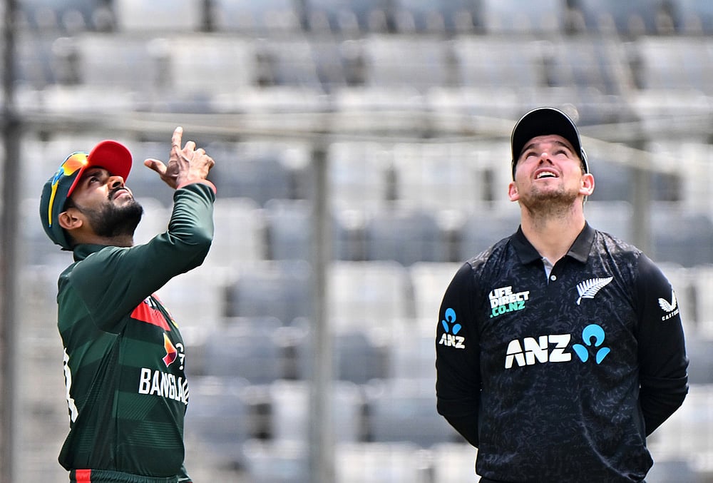 | Photo: AP/Mosaraf Hossain : Bangladeshs captain Mehity Hassan Miraz toss the coin as New Zealands captain Tom Latham looks on during the second one day international cricket match between Bangladesh and New Zealand in Mirpur, Bangladesh.