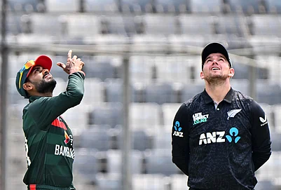 | Photo: AP/Mosaraf Hossain : Bangladeshs captain Mehity Hassan Miraz toss the coin as New Zealands captain Tom Latham looks on during the second one day international cricket match between Bangladesh and New Zealand in Mirpur, Bangladesh.
