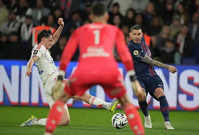 | Photo: AP/Christophe Ena : Lyons Thiago Almada, left, and PSGs Vitinha, right, challenge for the ball during the French League One soccer match between Paris Saint-Germain and Olympique Lyon in Paris, France.