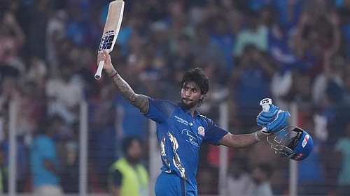 AP Photo : Mumbai Indians Tilak Verma celebrates his century during the Indian Premier League cricket match between Gujarat Titans and Mumbai Indians in Ahmedabad.
