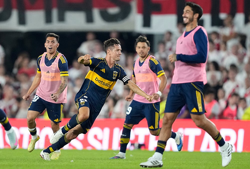 | Photo: AP/Natacha Pisarenko : Boca Juniors Ander Herrera celebrates defeating River Plate in an Argentine soccer league match in Buenos Aires, Argentina.