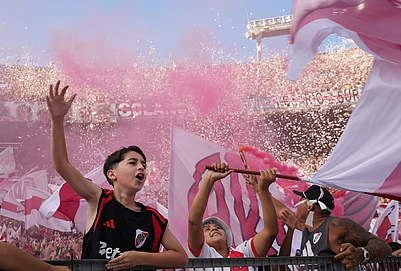 | Photo: AP/Rodrigo Abd : River Plate fans cheer during an Argentine league match between their team and Boca Juniors in Buenos Aires, Argentina.