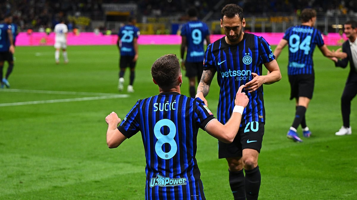 Inter/X : Hakan Calhanoglu and Petar Sucic celebrate as Inter Milan complete comeback victory for Como in Coppa Italia 2025-26 semi final at San Siro. 