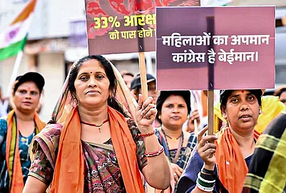 | Photo: Handout via PTI : Women take part in the Jan Aakrosh Mahila Padyatra.