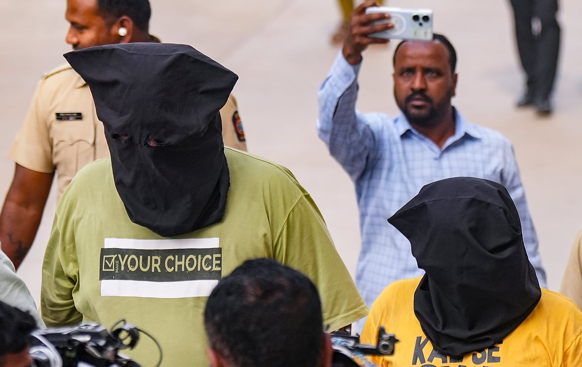 Two accused in the case being taken to the court. 