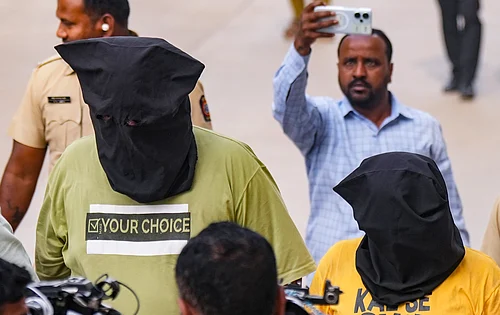 Two accused in the case being taken to the court.