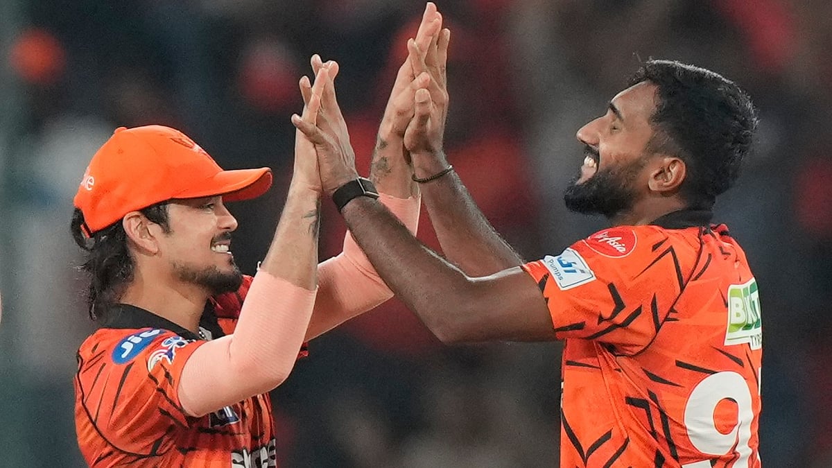 AP Photo : Sunrisers Hyderabads Eshan Malinga, right, and Sunrisers Hyderabads captain Ishan Kishan celebrates the wicket of Delhi Capitals Nitish Rana during the Indian Premier League cricket match between Sunrisers Hyderabad and Delhi Capitals in Hyderabad.